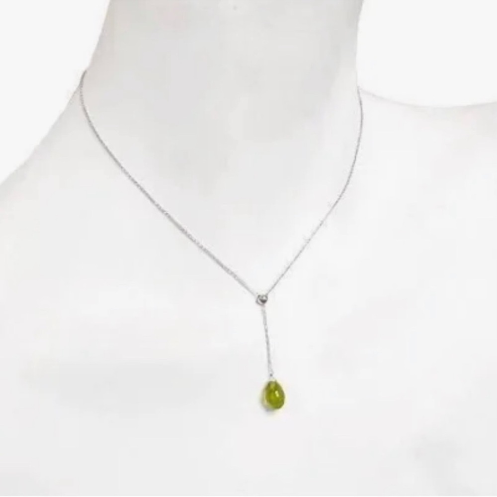 Tiffany and Co rain drop necklace with Peridot stone. 18k white gold necklace.